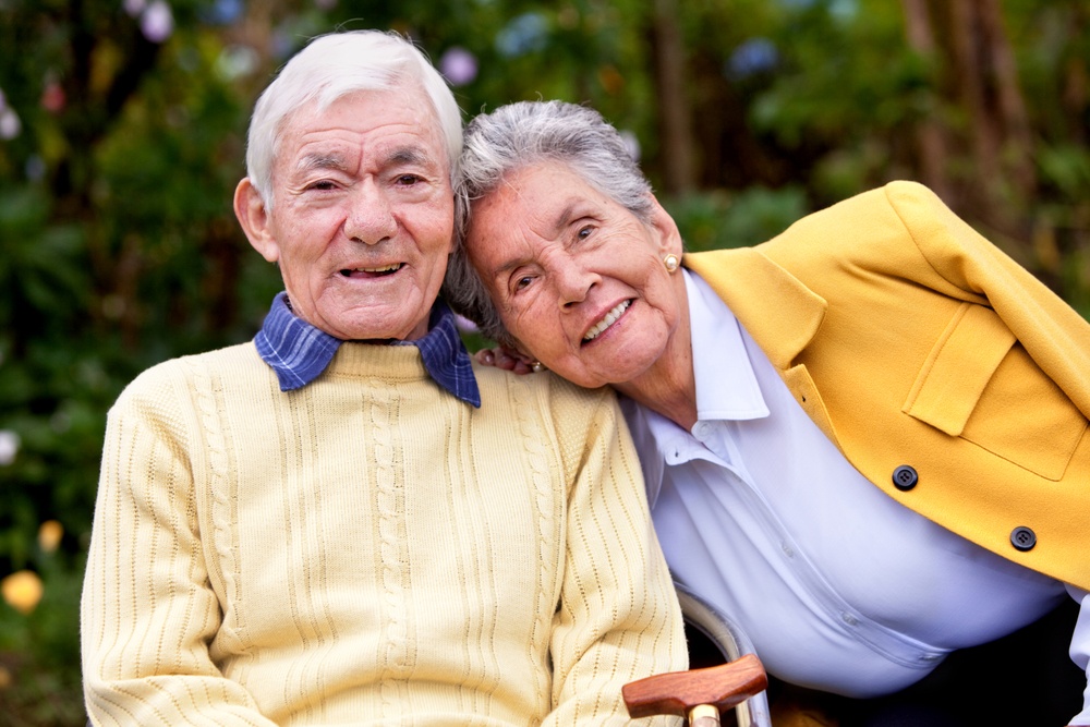 portrait of a loving elderly couple outdoors.jpeg